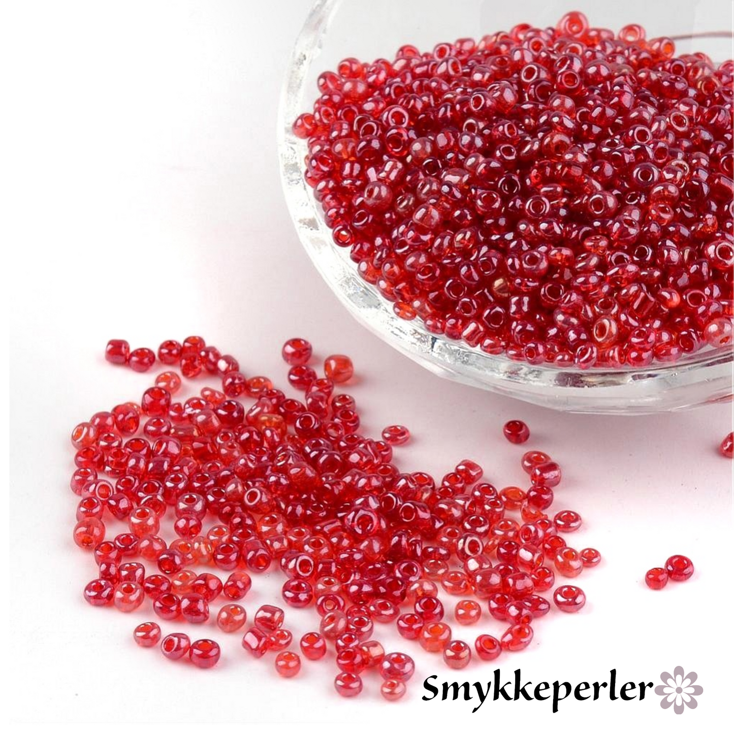 Seed beads rød transparent. Ca. 3 mm.